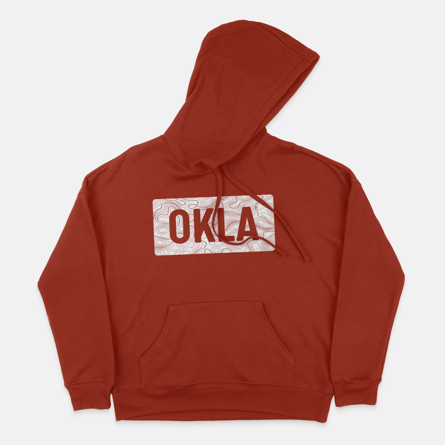 The OKLA Navigator BOLD Hoodie, fashioned from recycled cotton, features a red hue with a front pocket and boasts a bold "OKLA" in large letters against its rectangular design. The hoodie comes with a subtle swirling background pattern that enhances the unisex fit, complemented by the hood laid flat for a streamlined appearance.
