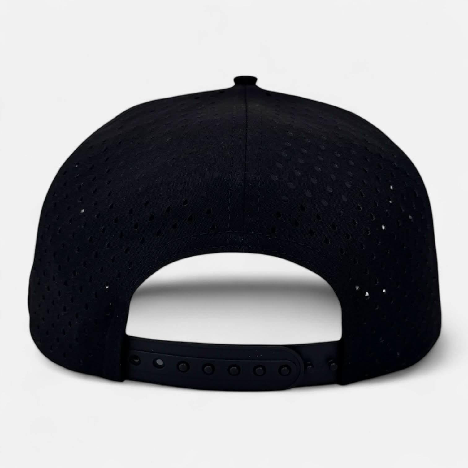 Introducing the OKLA Navigator Hat, a black perforated baseball cap designed to be seen from the back, complete with an adjustable snapback closure, and enhanced with sweat-wicking technology for superior comfort.