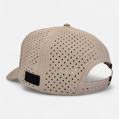 The OKLA Navigator Hat is displayed from the back, featuring an adjustable strap and a beige perforated design for improved airflow. A black label with "OKLA" text adds detail, while its sweat-wicking technology ensures comfort.