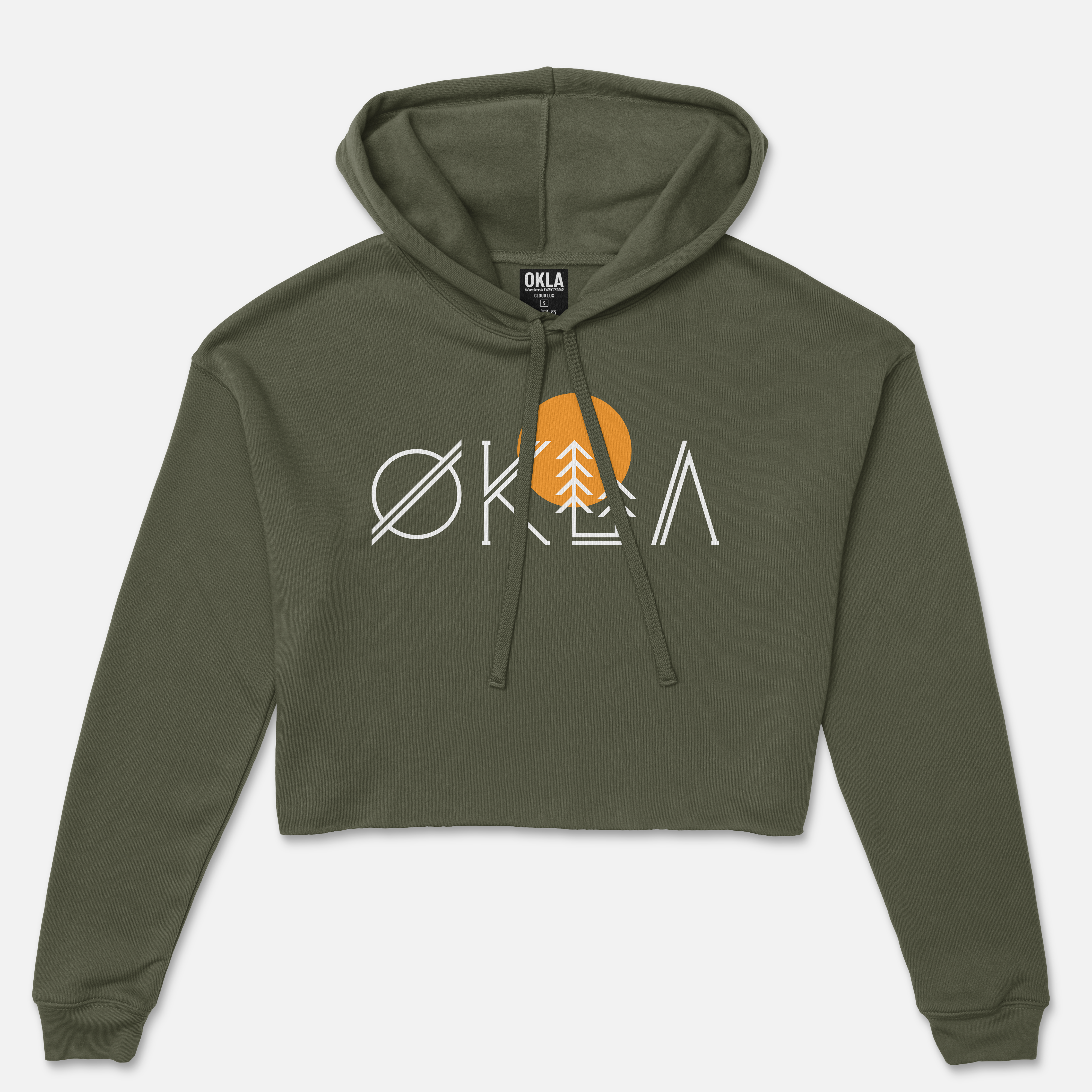 The OKLA Native Crop Hoodie is a stylish dark green fleece hoodie with a cropped design, complete with a hood and drawstrings. The front showcases "OKLA" in artistic white lettering, accented by a tree and an orange circle. The brand label, OKLA, is prominently placed inside the collar—an ideal piece poised to capture attention in any fashion magazine.