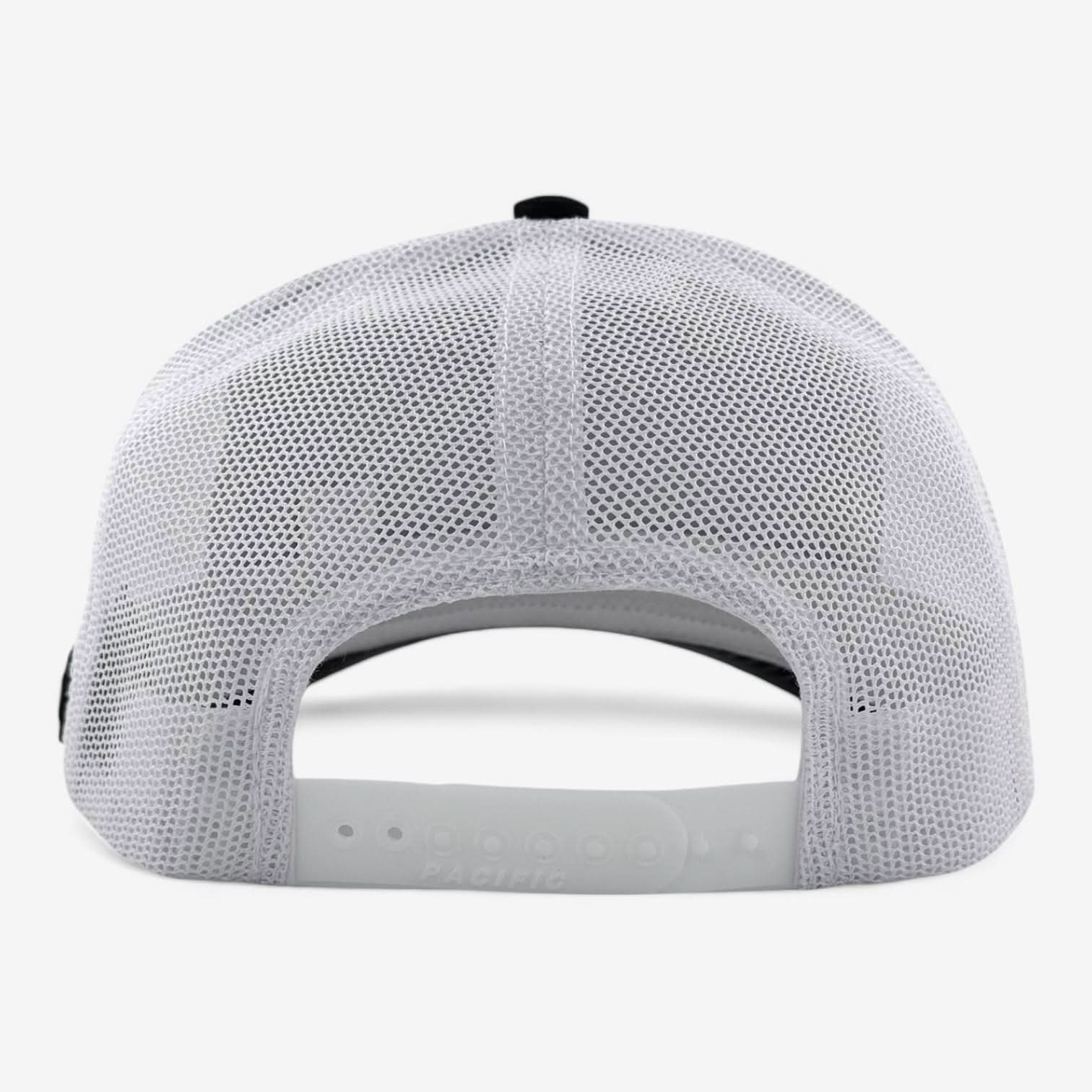 The image highlights the back view of an OKLA Legacy Trucker Hat, a baseball cap characterized by its white mesh design and adjustable snapback closure. It features a curved brim and high-quality mesh fabric to ensure ventilation while offering a vintage-inspired appeal with its PVC patch charm.