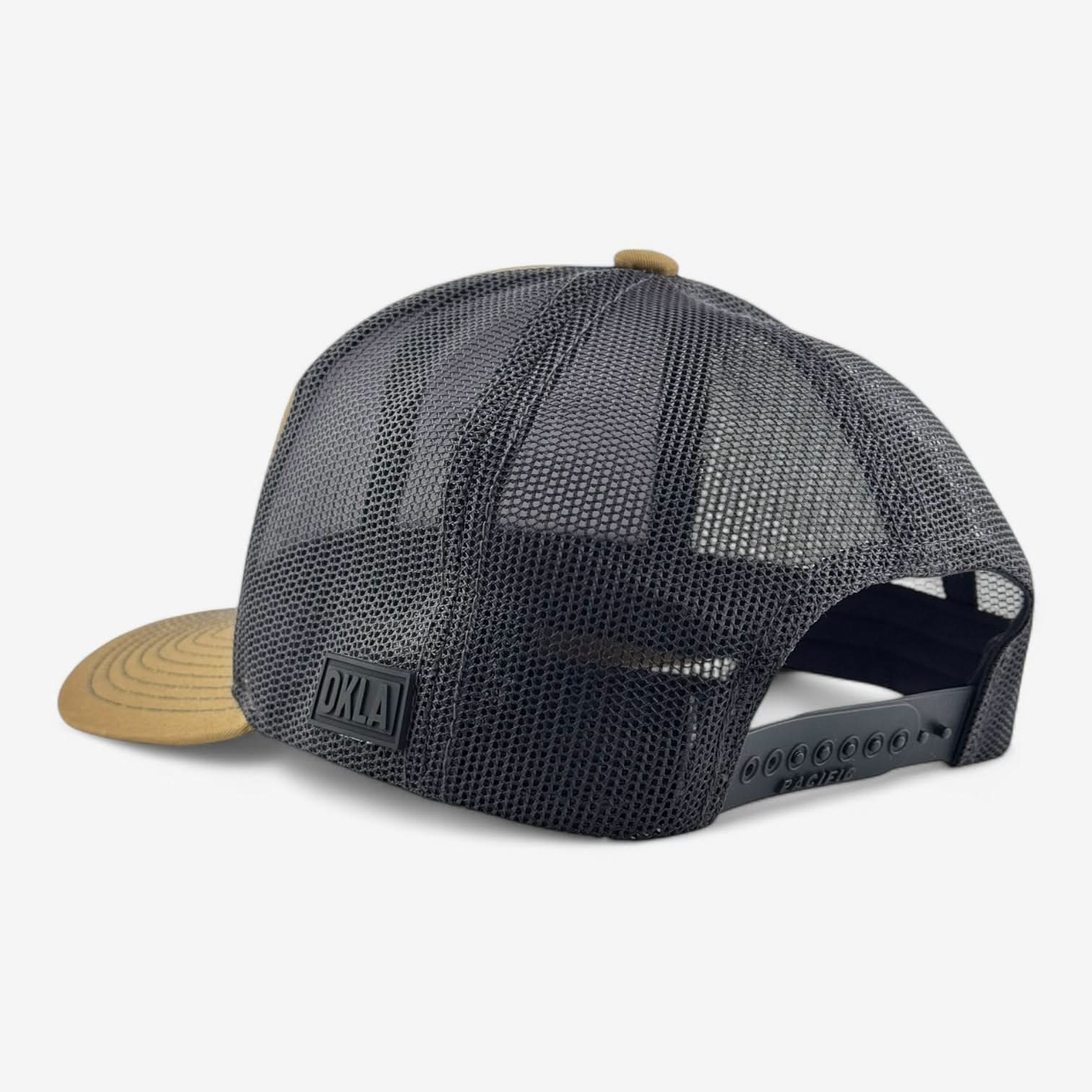 The OKLA Legacy Trucker Hat, with its premium black mesh fabric and brown curved brim, features an adjustable strap at the back and a vintage-style PVC patch labeled OKLA, offering both style and practicality.